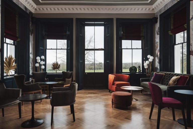 Seating around tables in Winslade Manor bar